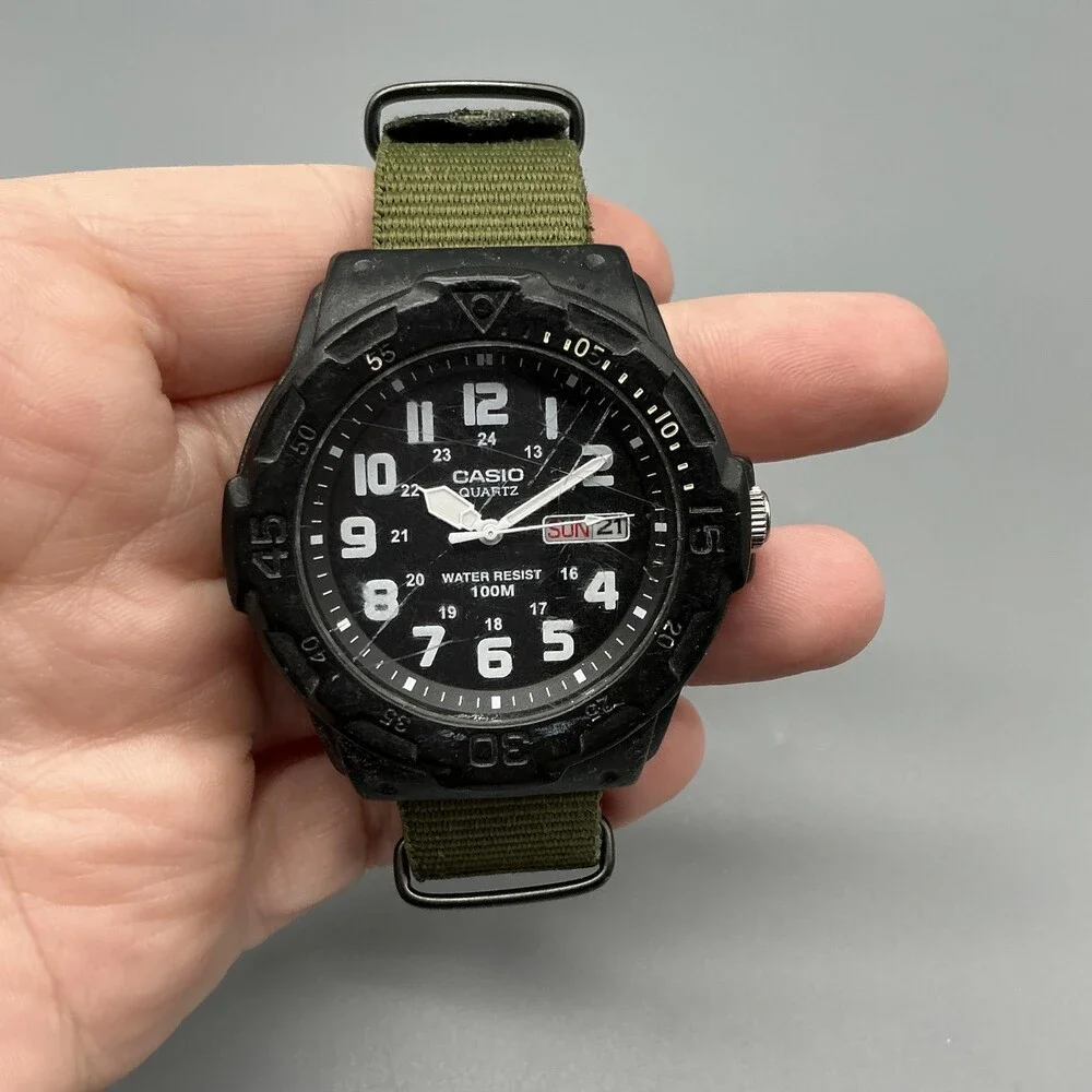 Casio MRW-200H Mens Watch 43mm Black Dial Green Day Date 100M New Battery